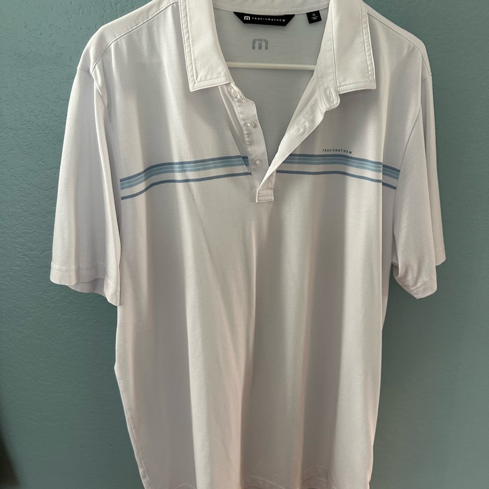 Travis Mathew White Polo with Light Blue Accents
